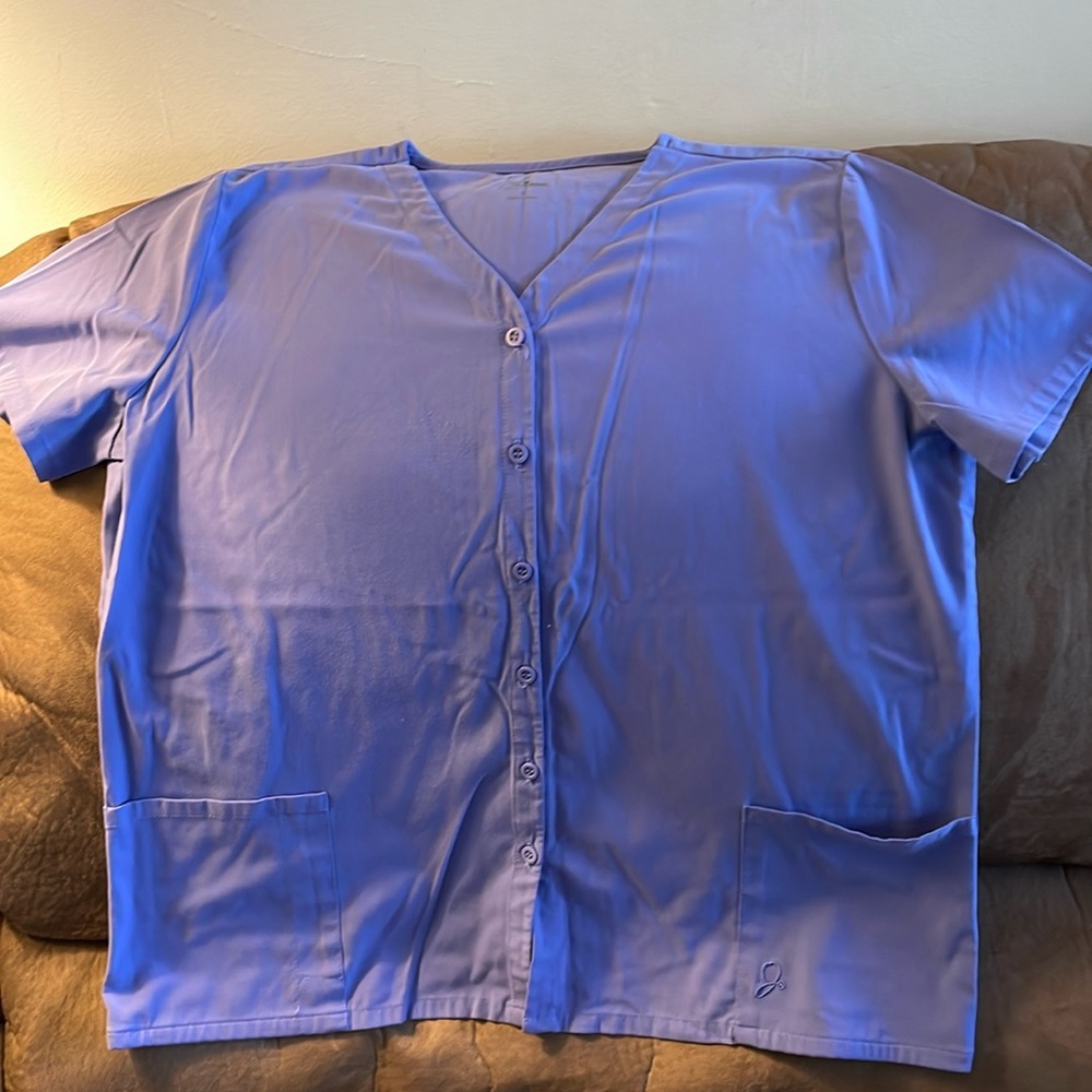 Women’s Ceil Blue Jaanuu scrub top. Worn once. Size large.